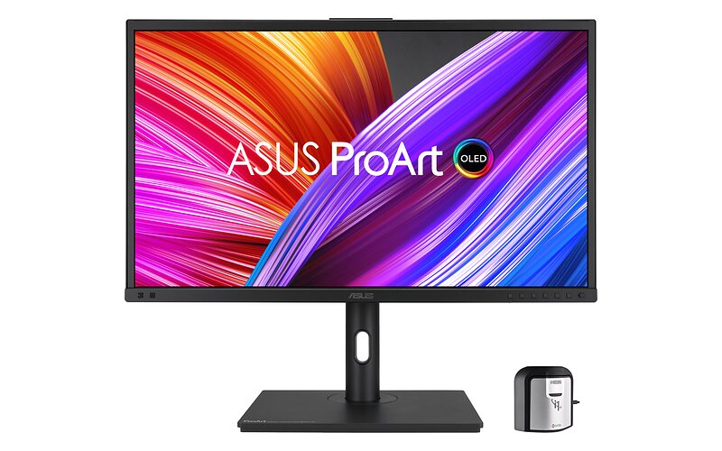 Asus ProArt Display OLED PA27DCE-K s přiloženým kolorimetrem X-rite vedle stojanu